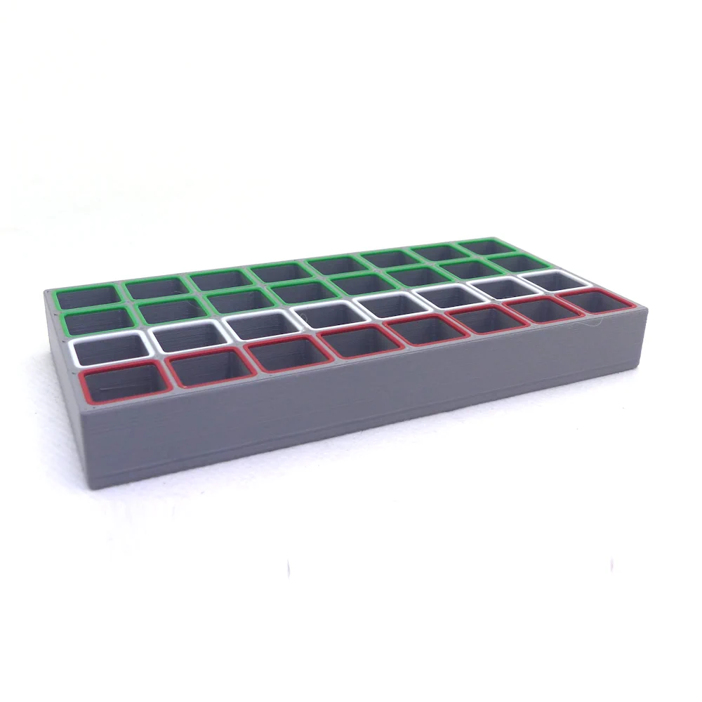 boîte à compartiments avec codes de couleurs